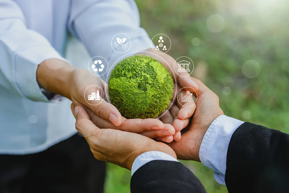 Hand of Business man holding green earth and ESG icon for Environment Social and Governance, World Sustainable Environment technology concept.